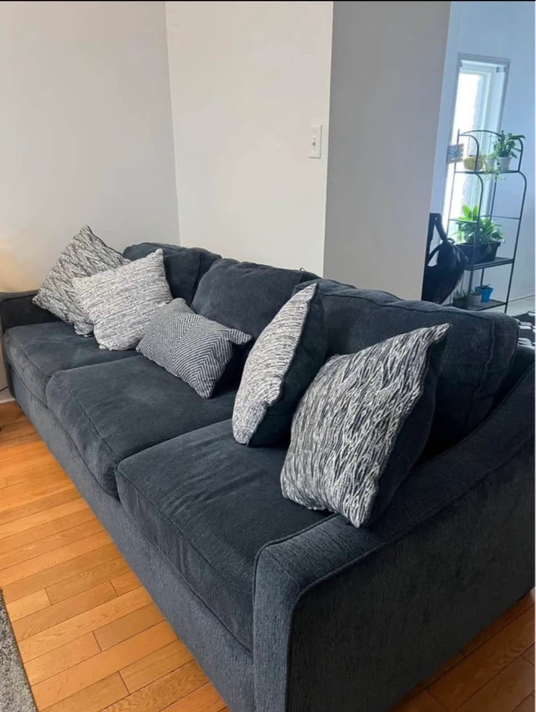 Dark Navy Sofa with Accent Pillows