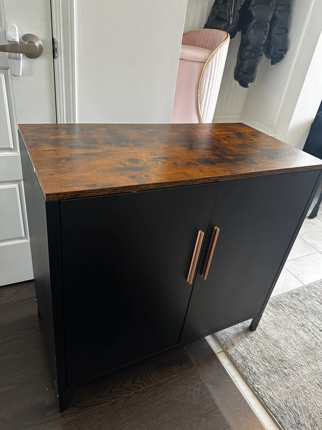 Black two-door cabinet with wood top