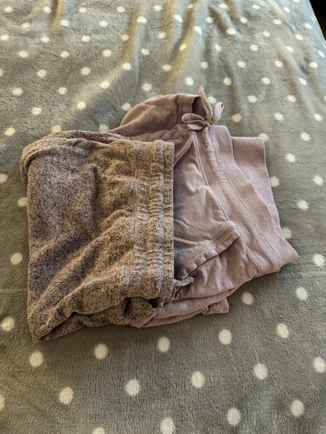 Folded Lavender and Heather Grey shorts