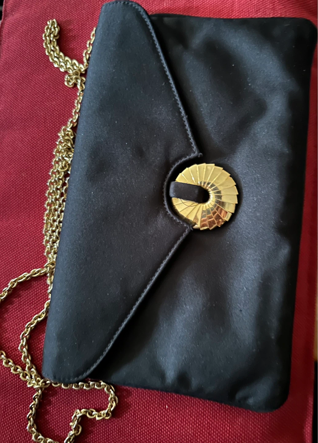Black clutch purse with gold chain