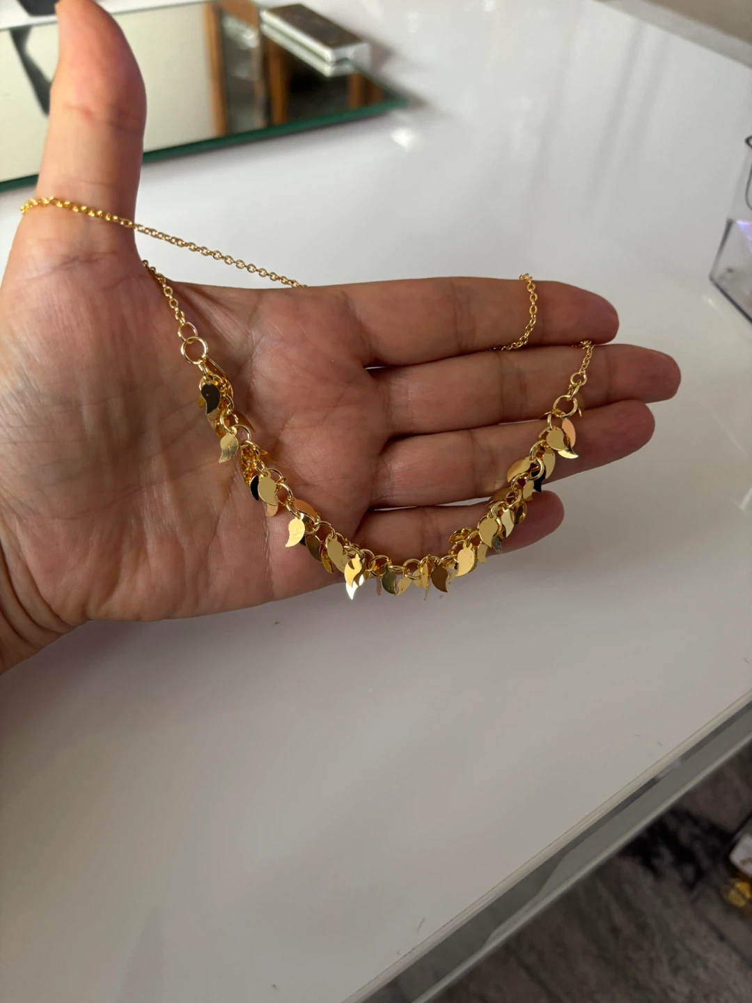 Gold plated necklace with leaf charms