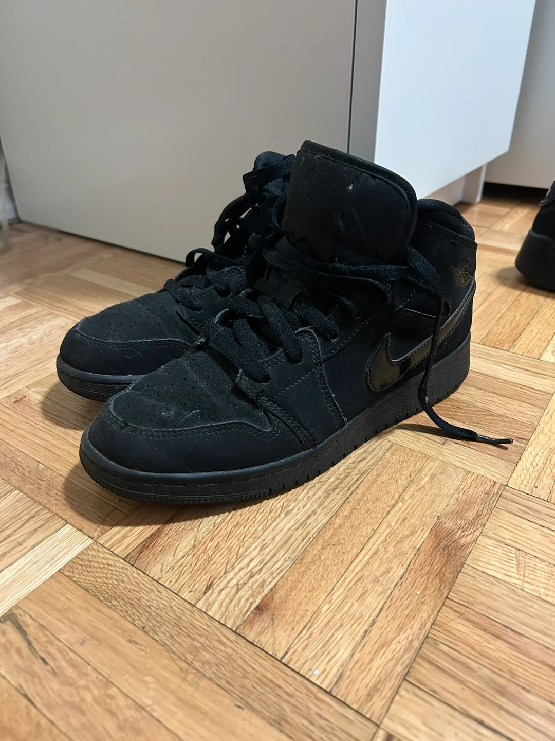 Air Jordan 1 Mid Black Sneakers