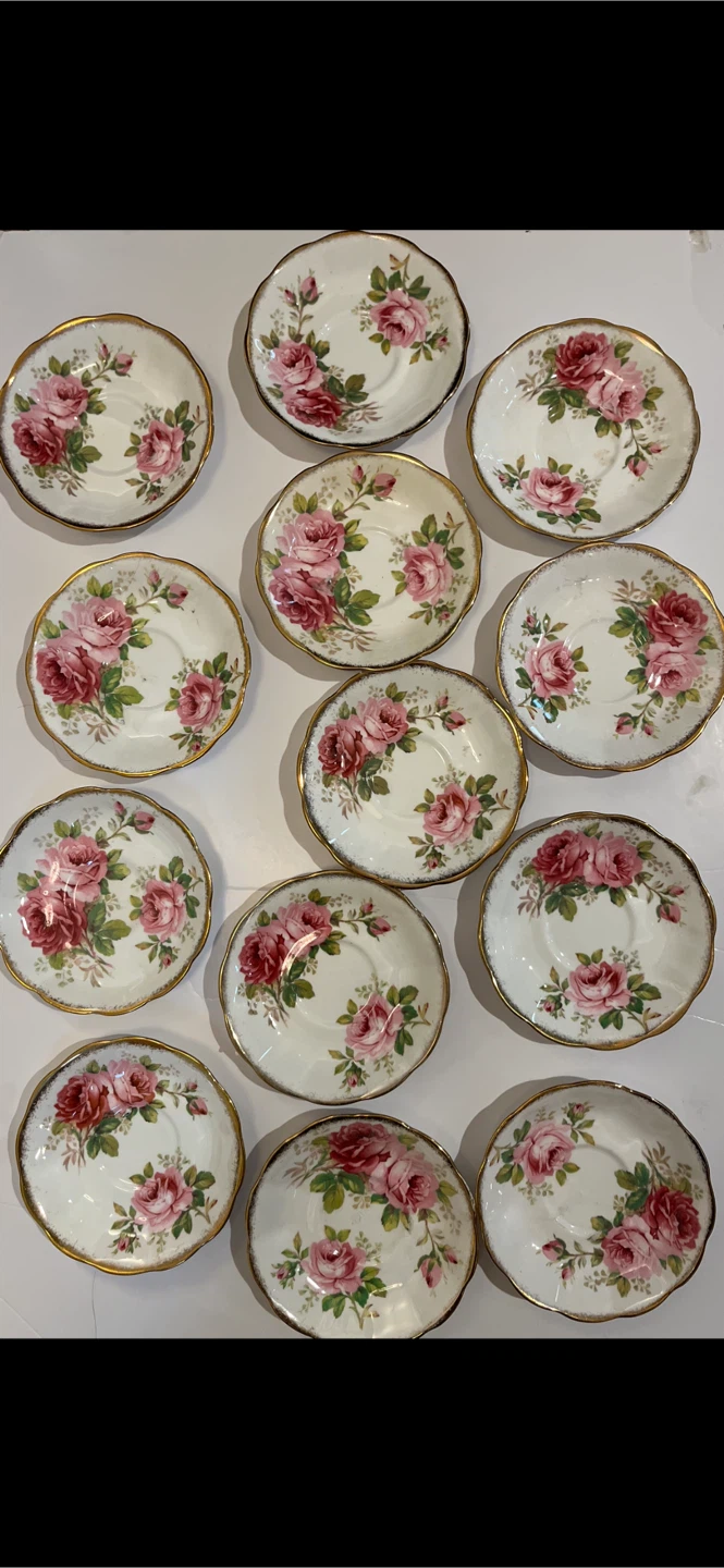 Set of 13 Royal Albert Rose Saucers