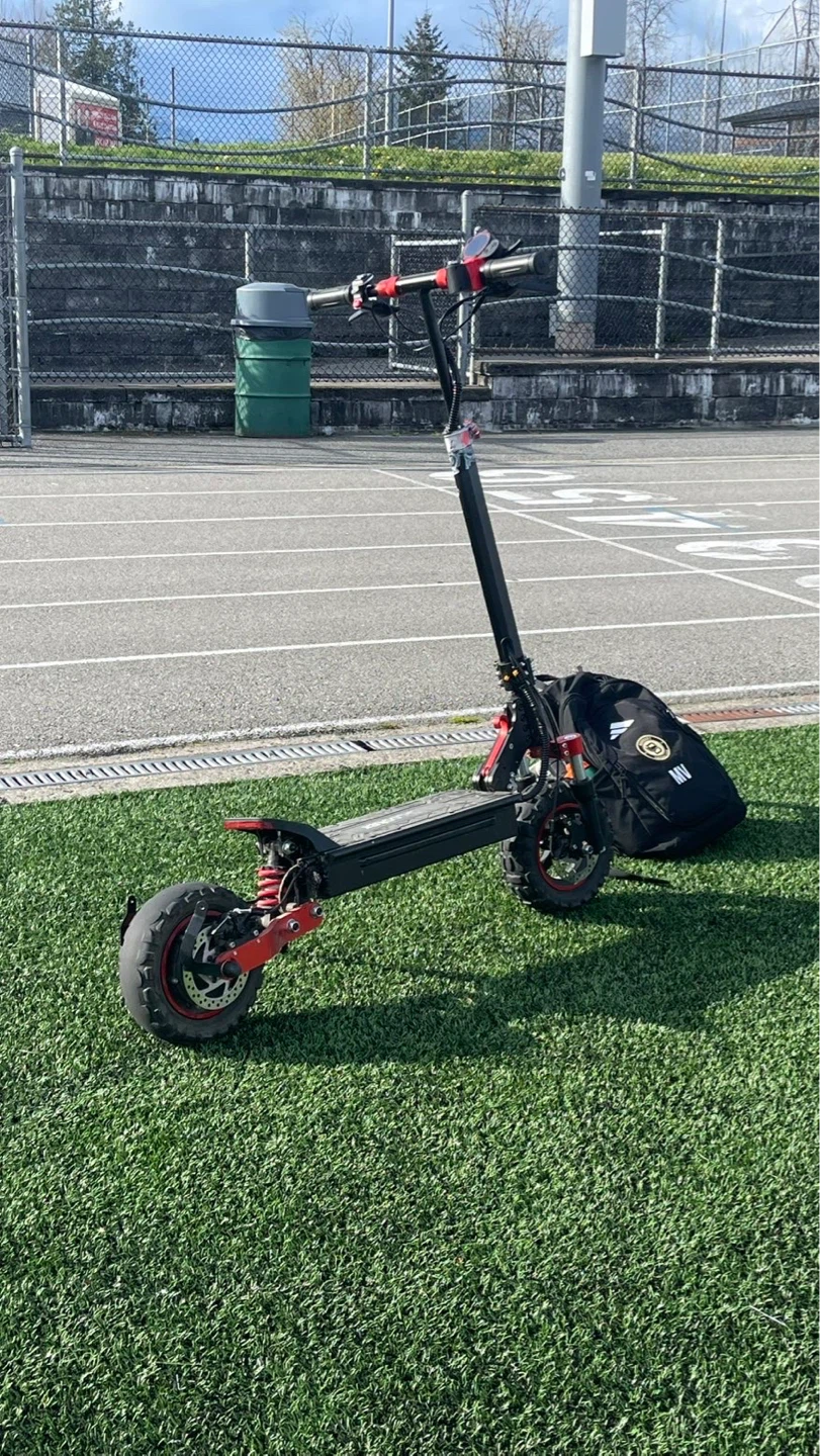 Electric Scooter with Front Suspension and Bag