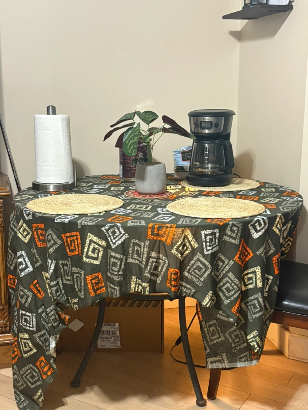 Round Dining Table with Southwestern Patterned Tablecloth
