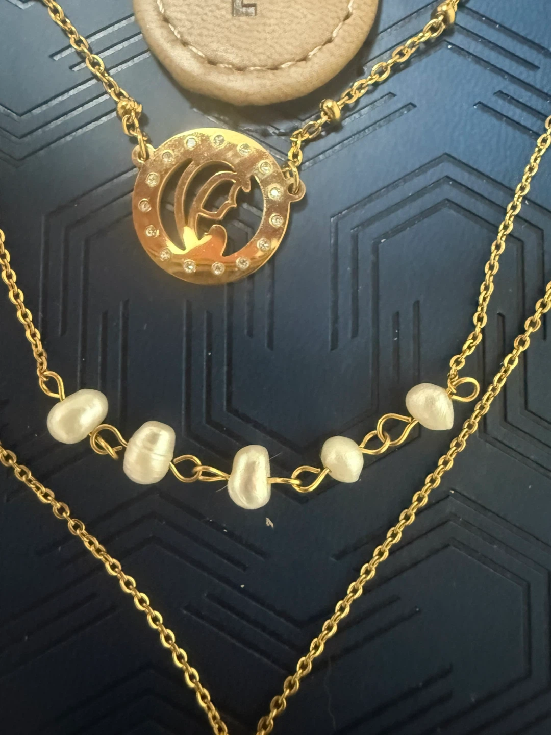 Gold tone layered necklace with cross and pearls - photo 3