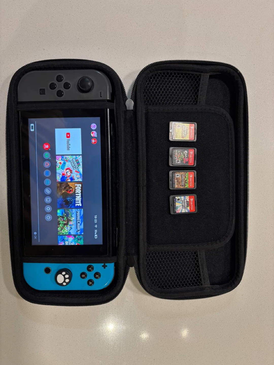 Nintendo Switch Console with Games and Case