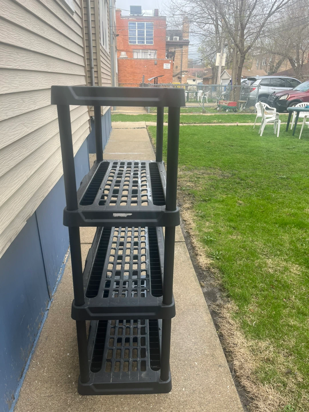 Black 4-Tier Plastic Shelving Unit - photo 3