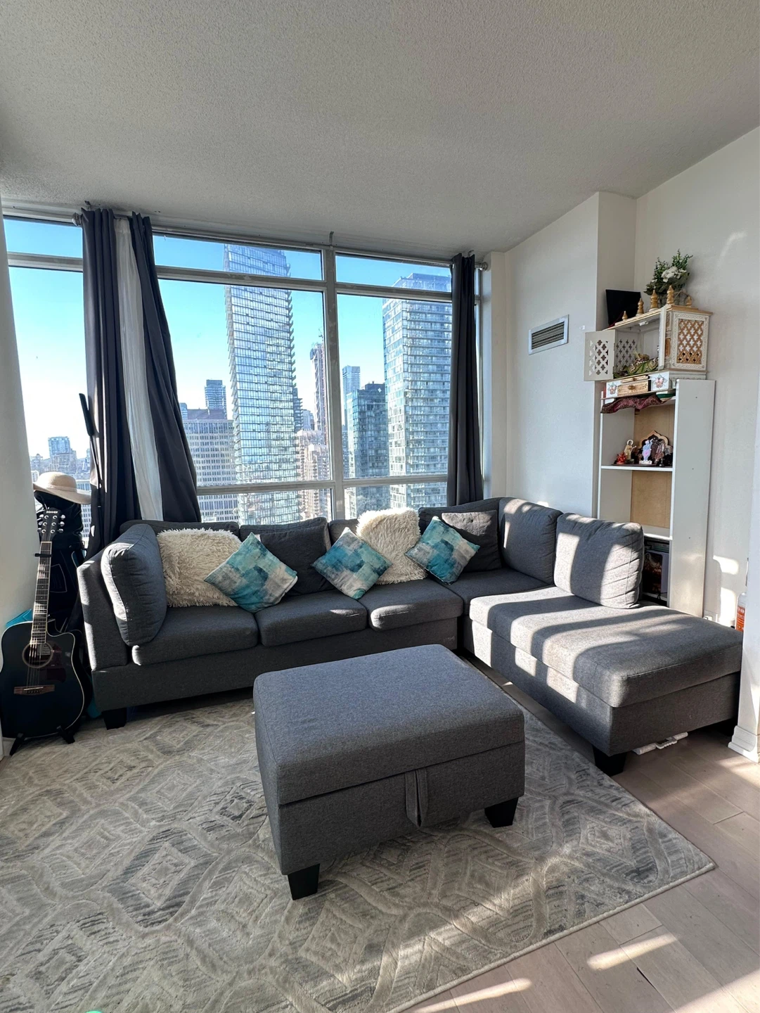 Grey Sectional Sofa with Ottoman and Pillows