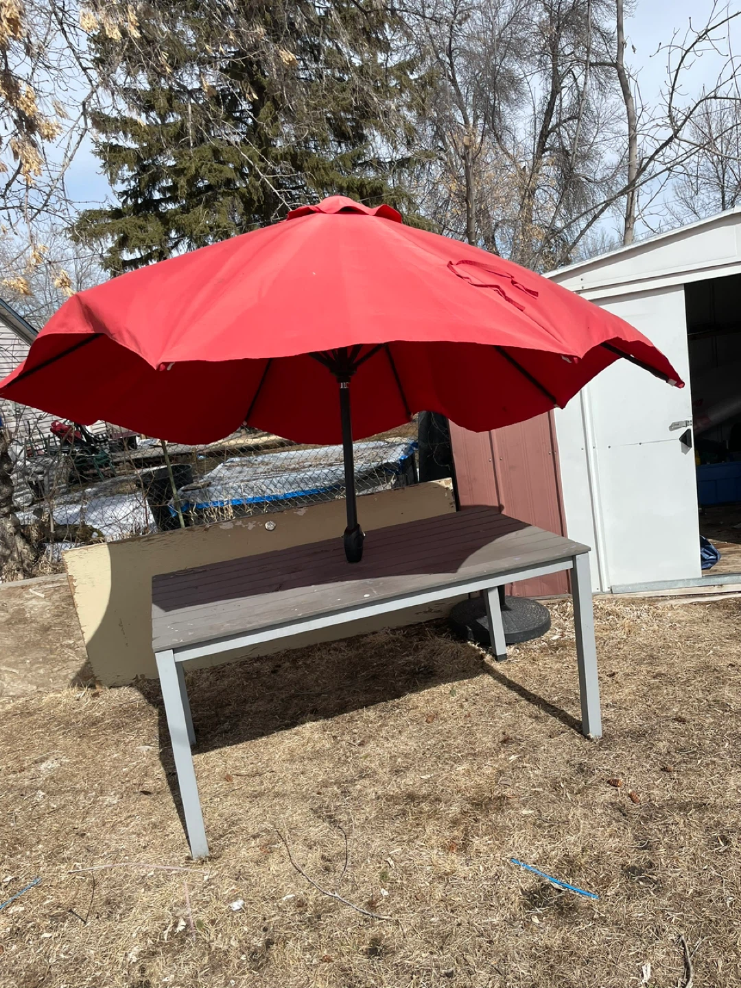 Patio table with umbrella and stand