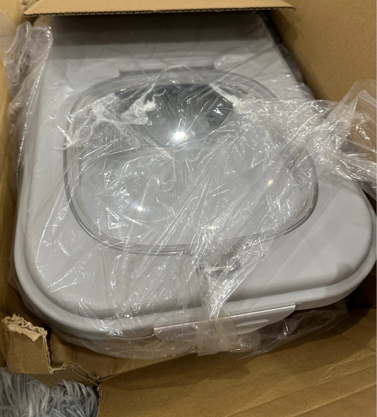 Grey food dispenser