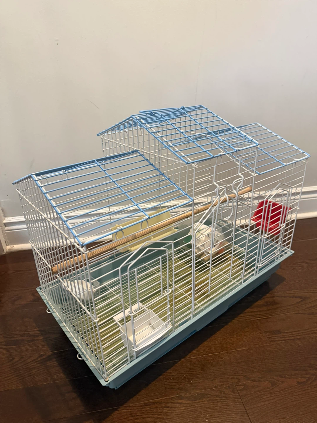 Blue and White Bird Cage with Perch and Feeder