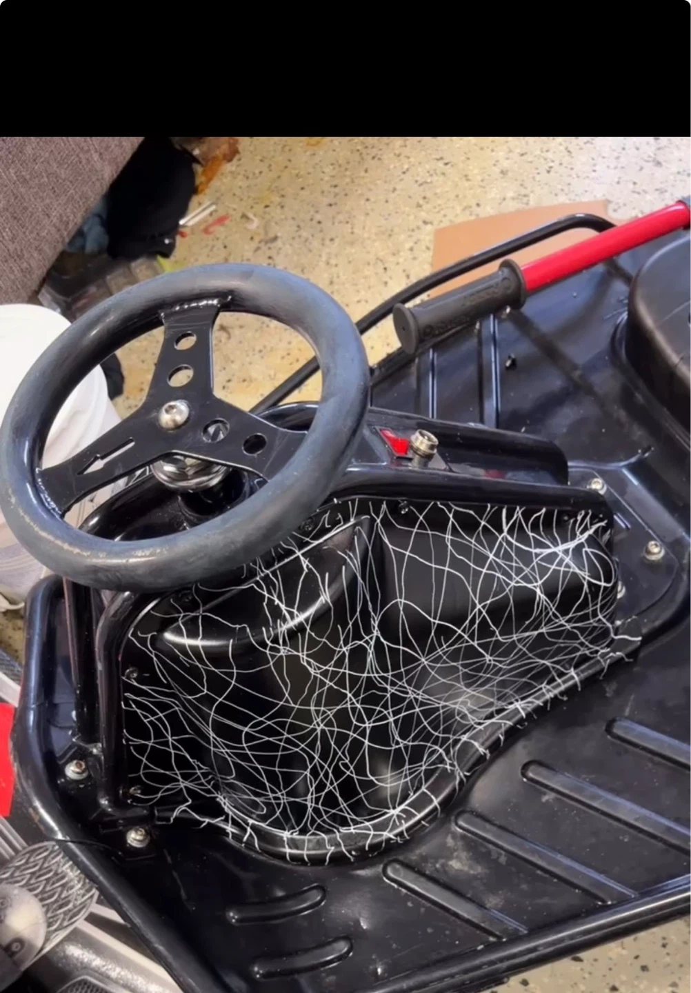 Black Ride-On Toy Car with Steering Wheel and Seat