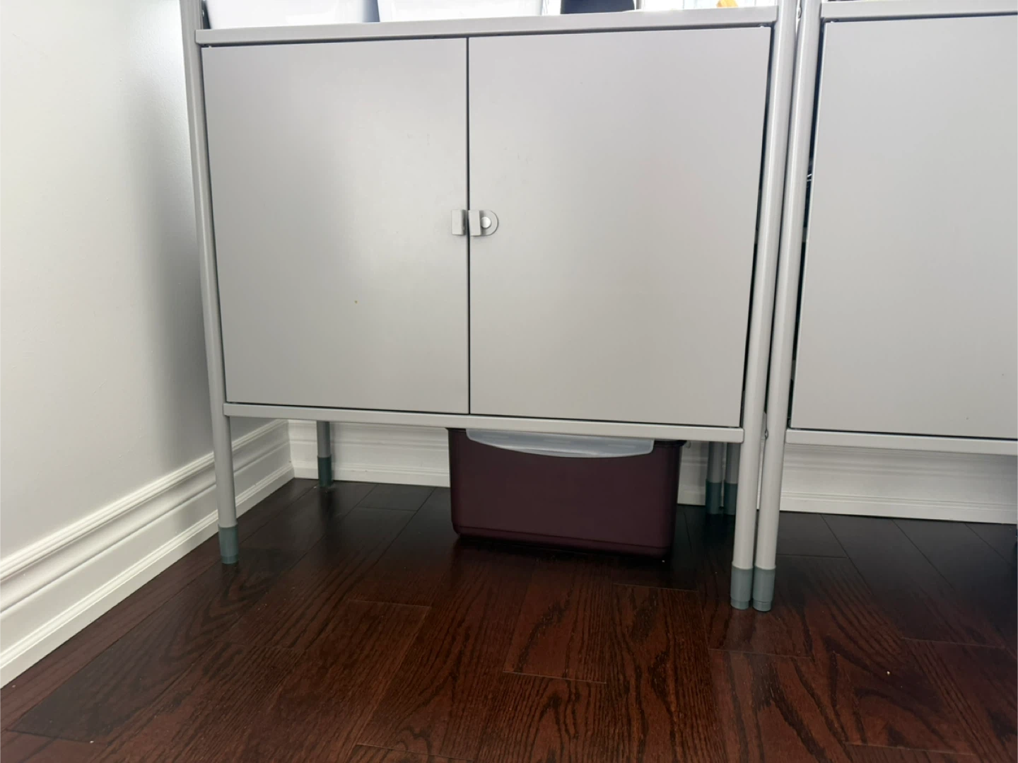 Grey metal cabinet with doors