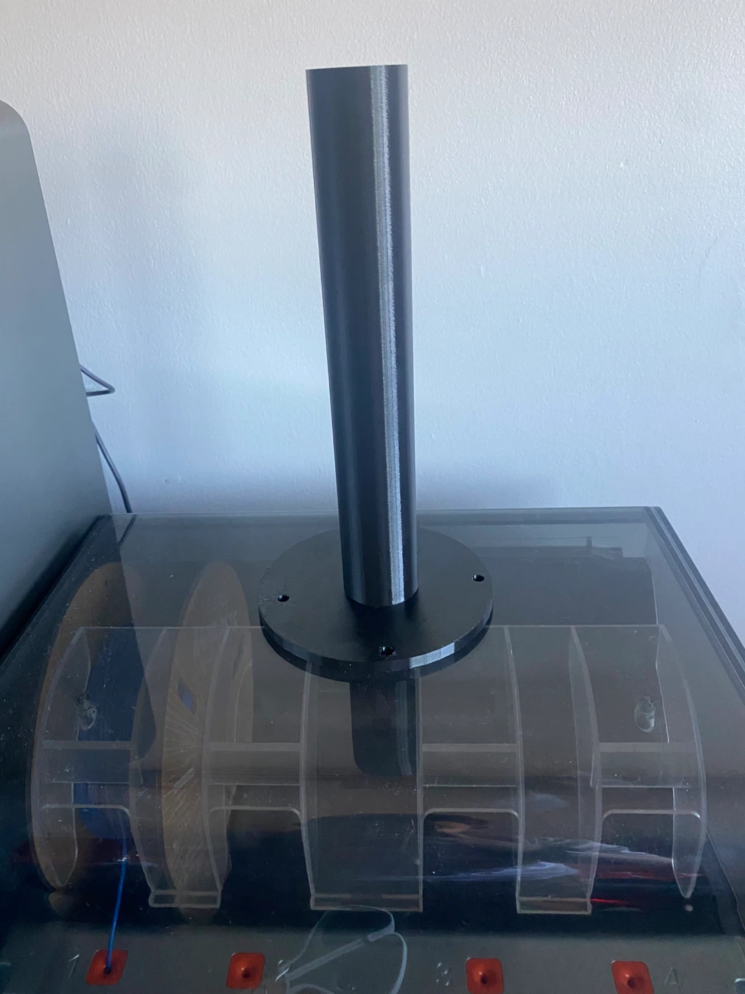 Filament stand for wall