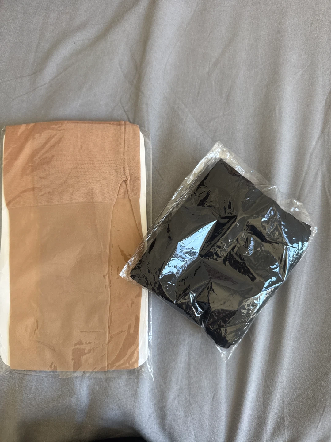 Two pairs of tights - nude and black