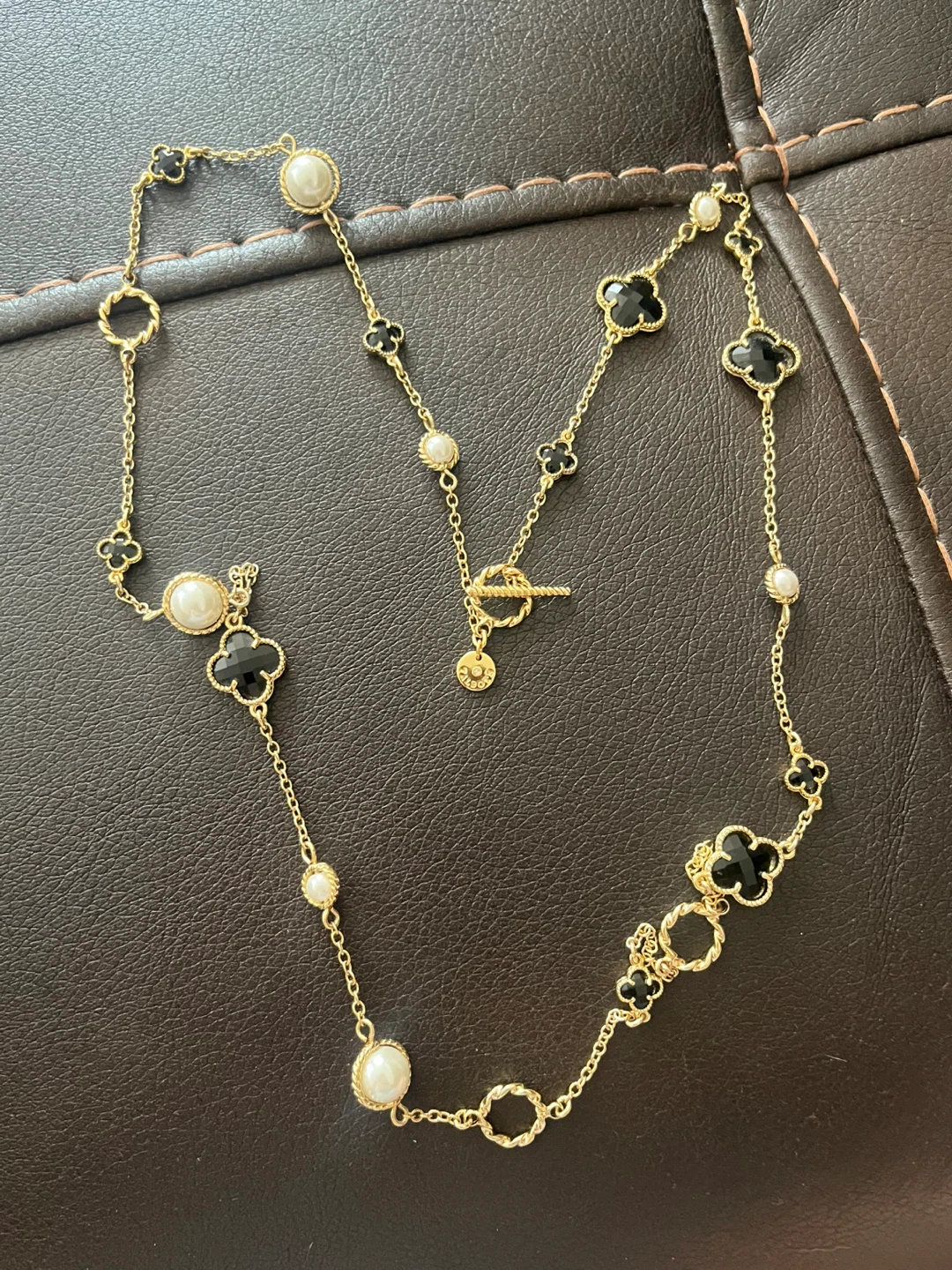 Gold-tone necklace with black clover charms and pearls - photo 2