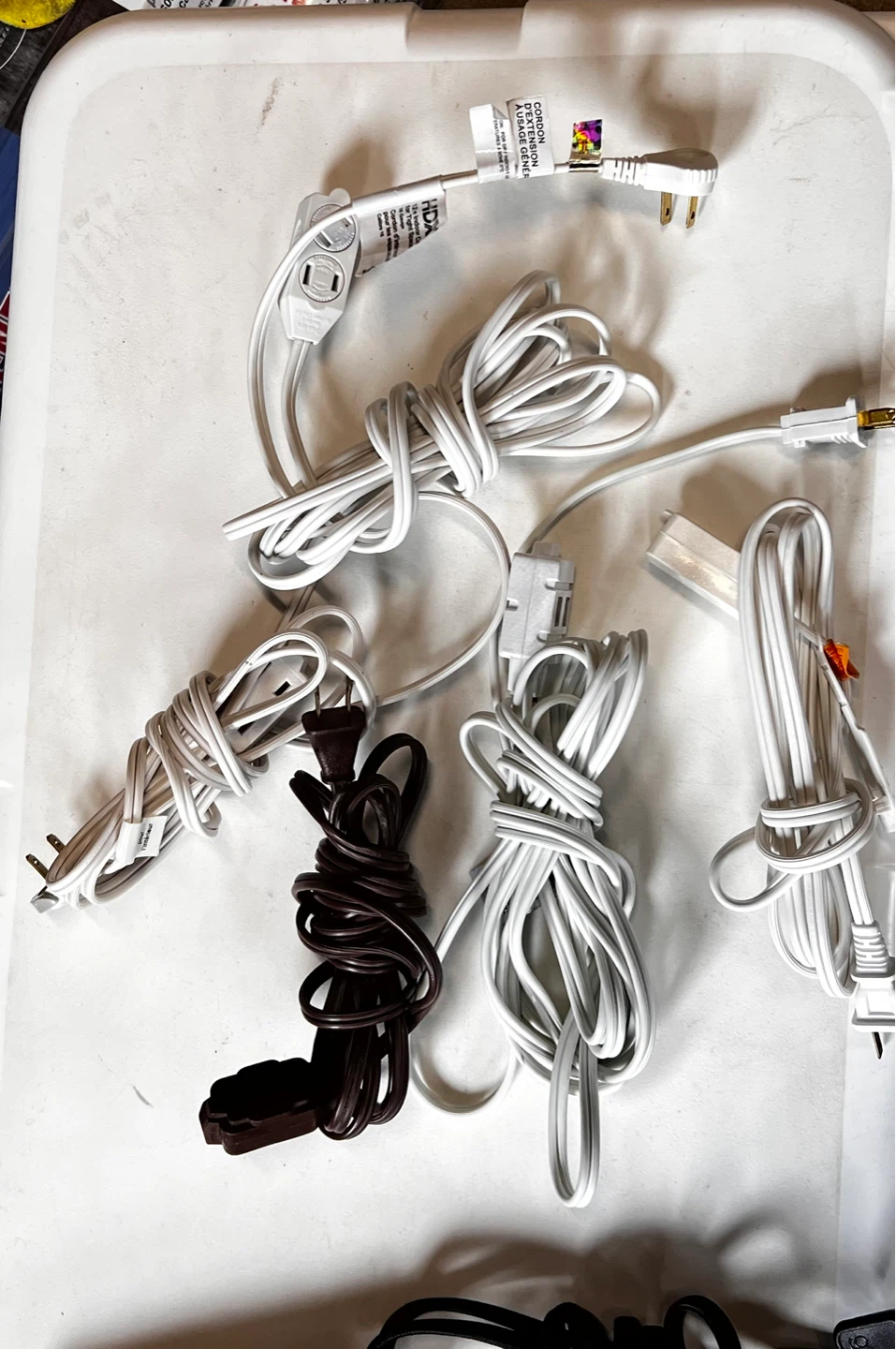 Bundle of White and Brown Extension Cords