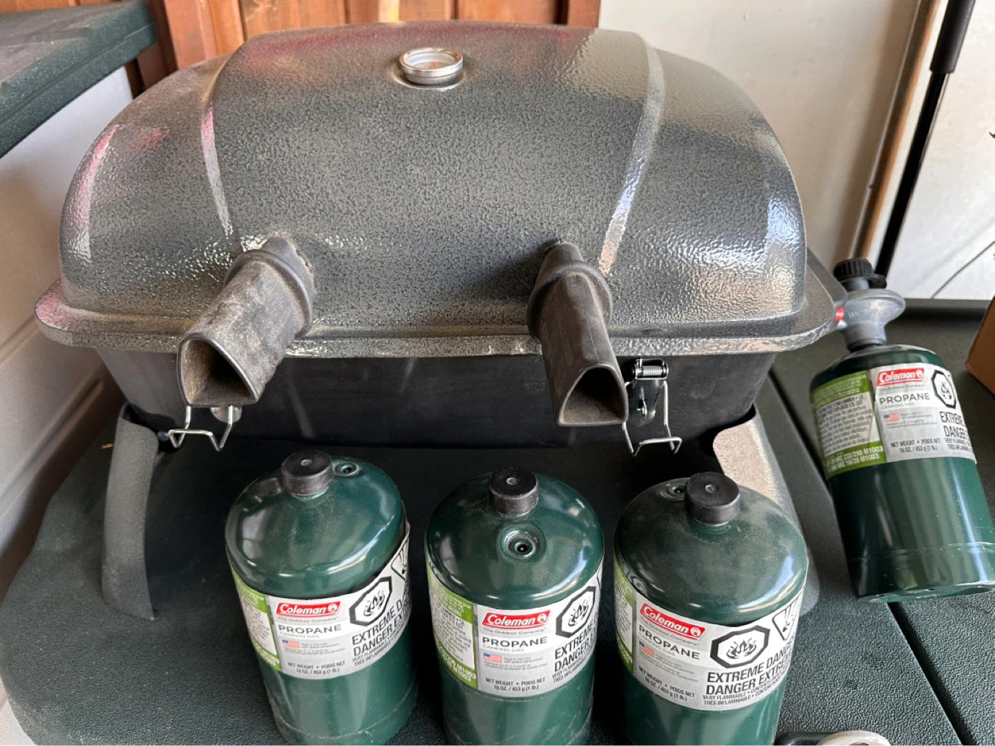 Coleman Portable Propane Grill with 4 Cans