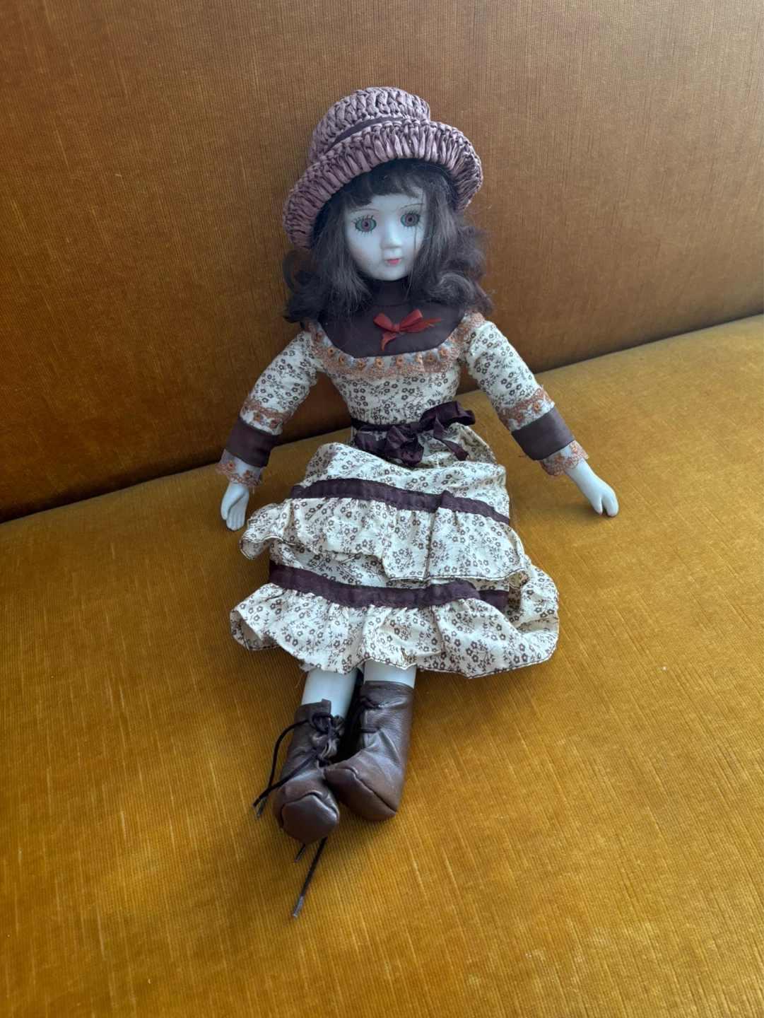 Vintage Porcelain Doll with Hat and Boots