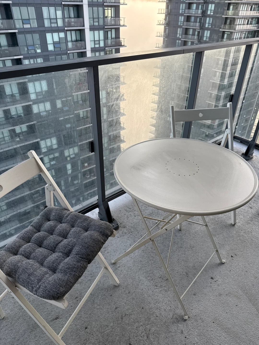 White metal bistro table and chairs set