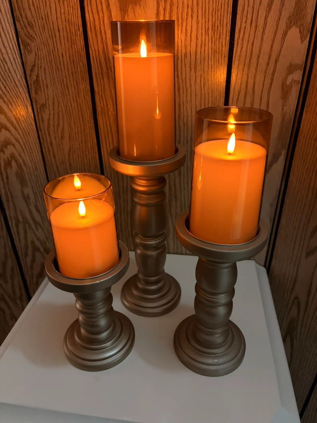 Set of 3 gold candle Holders with battery operated candles
