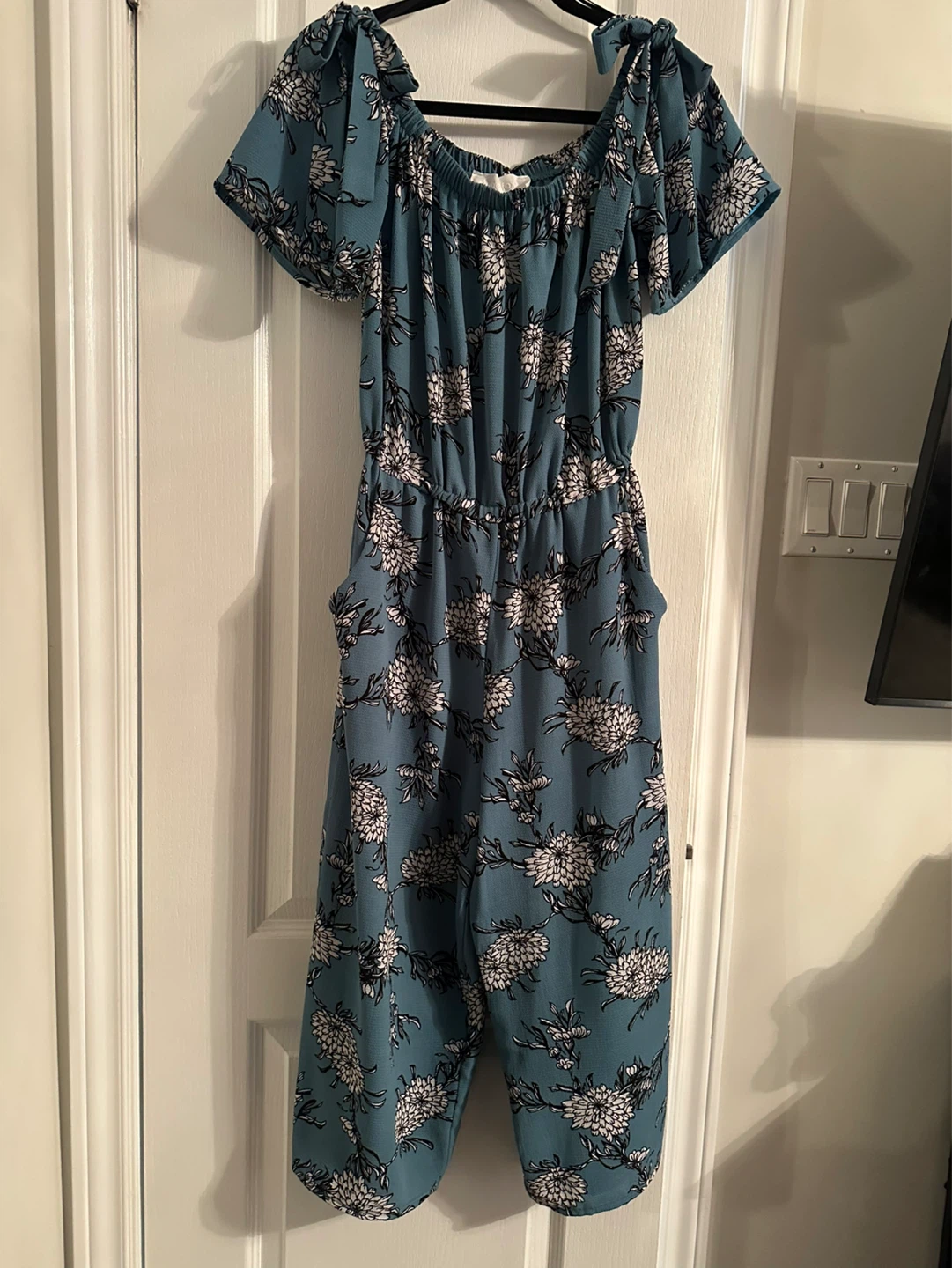 Teal floral off-the-shoulder jumpsuit