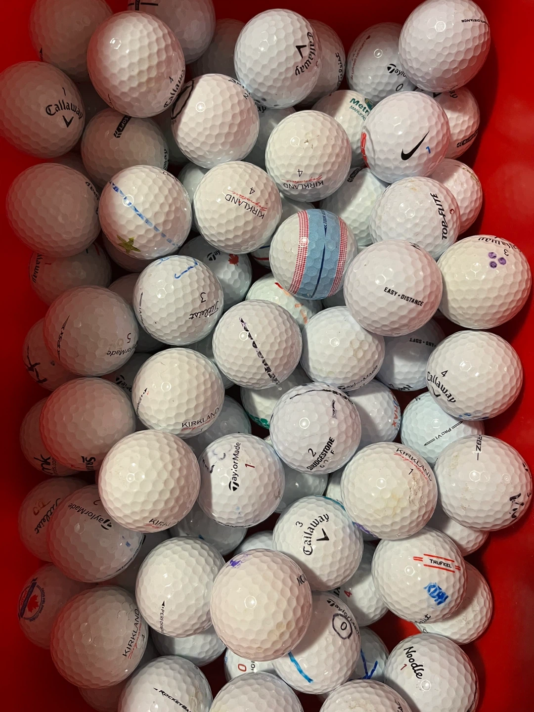50 used golf balls