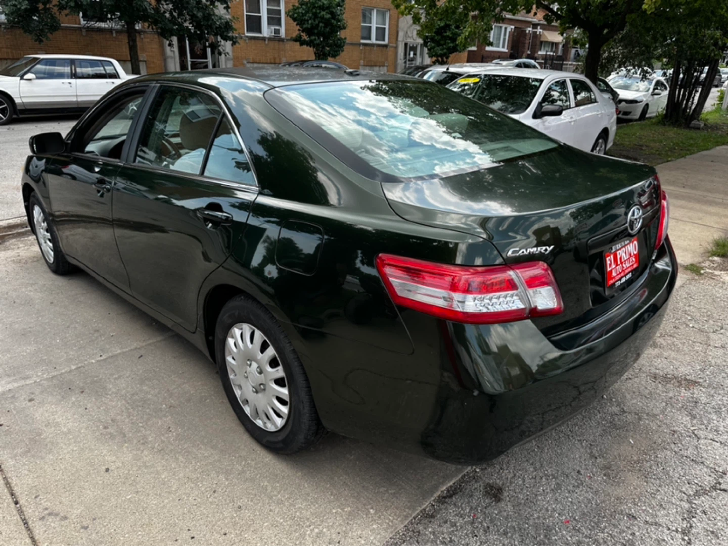 Dark Green Toyota Camry LE Sedan