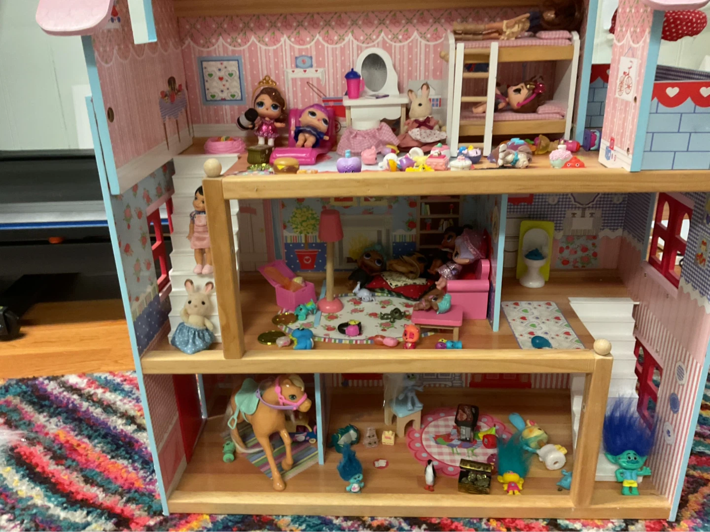 Wooden Dollhouse with Furniture and a variety of different toys