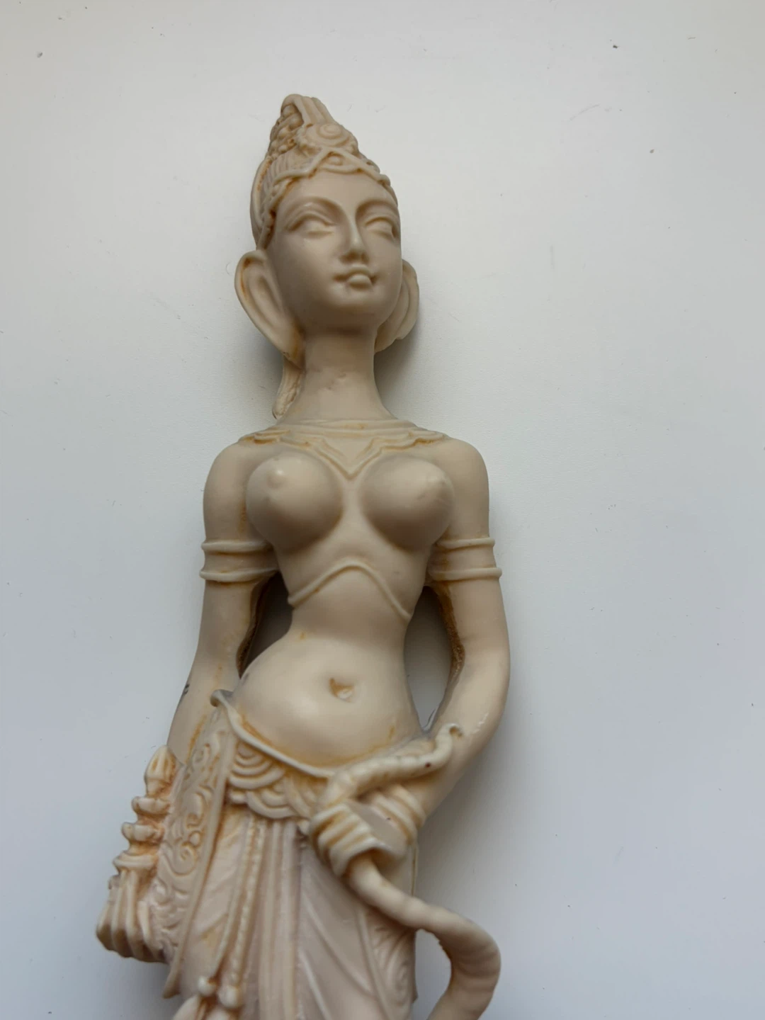 Figurine of a woman with a snake