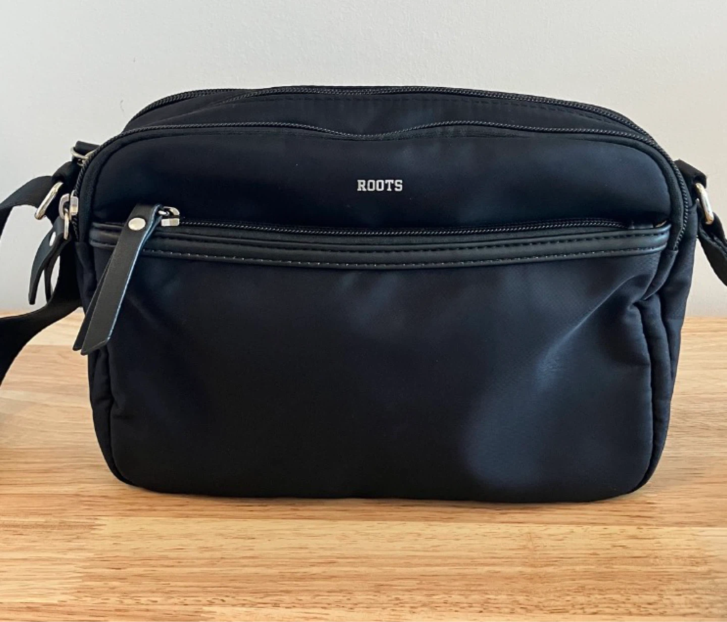 Roots Black Crossbody Bag
