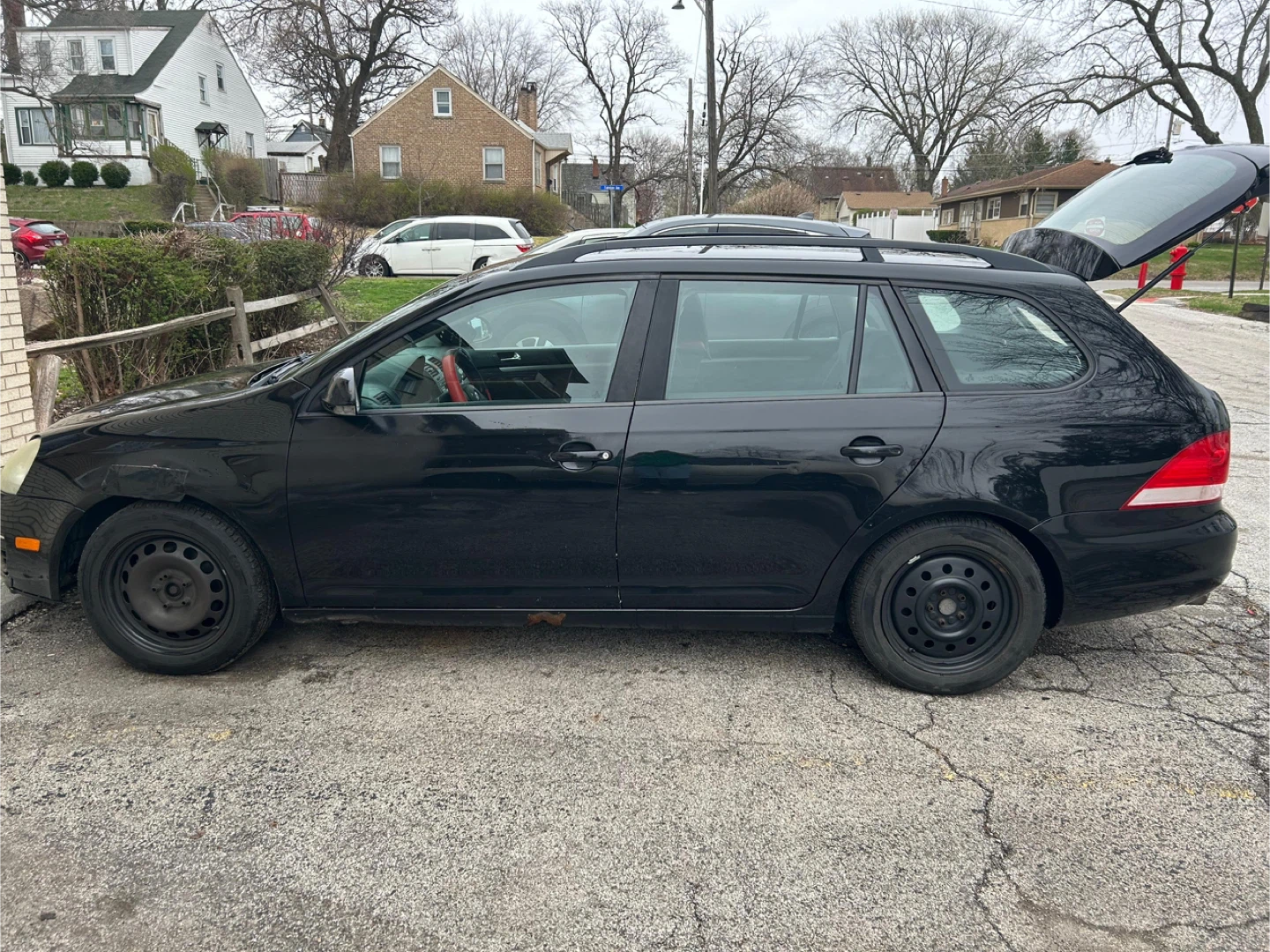 Black Volkswagen Jetta Sportwagen