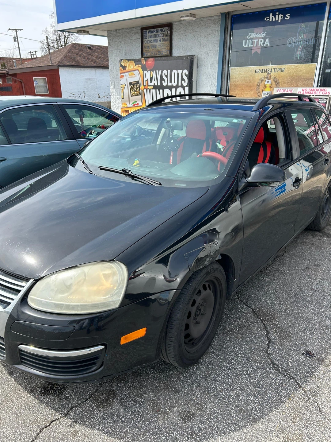 Black Volkswagen Jetta Sportwagen - photo 4