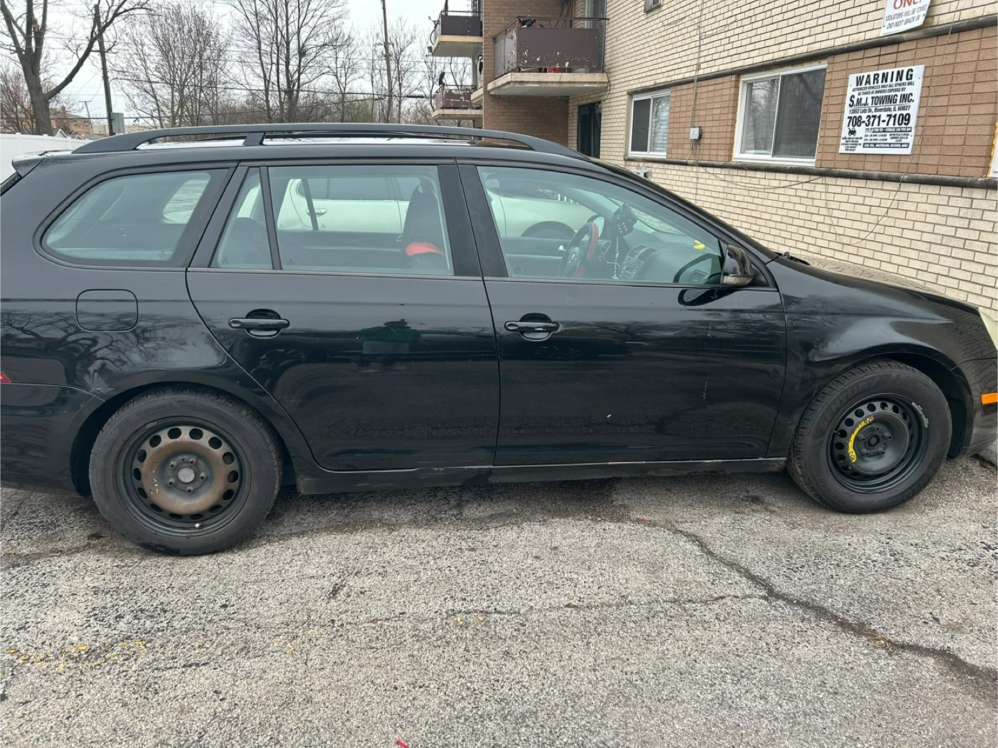 Black Volkswagen Jetta Sportwagen - photo 5