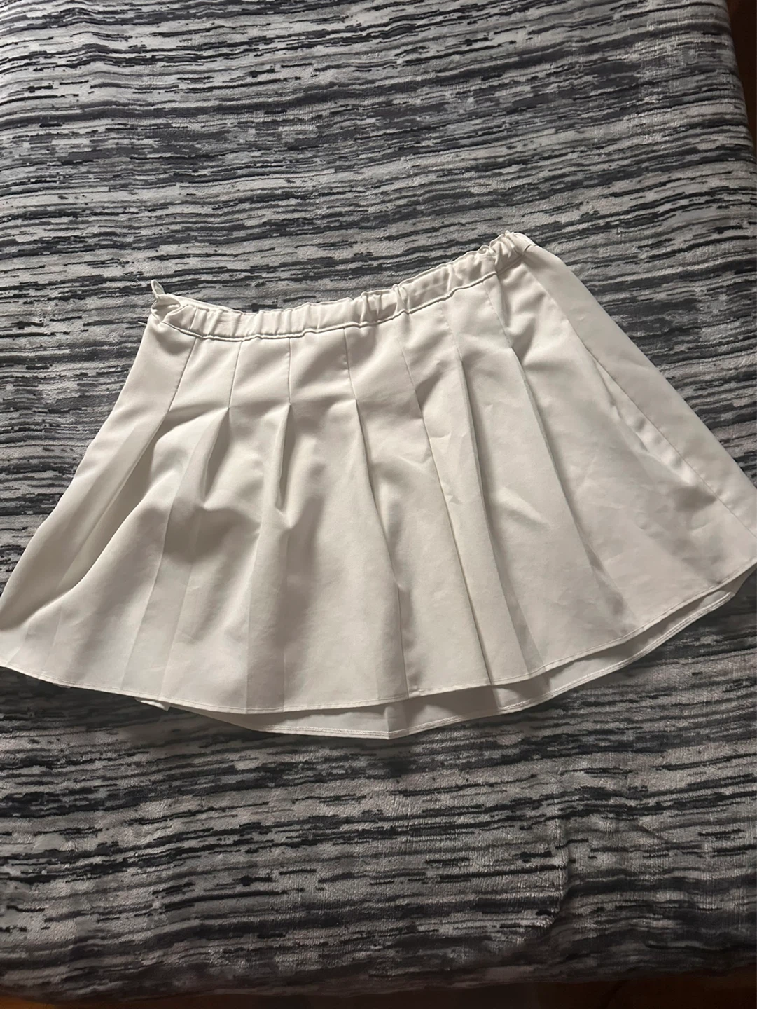 White pleated skirt
