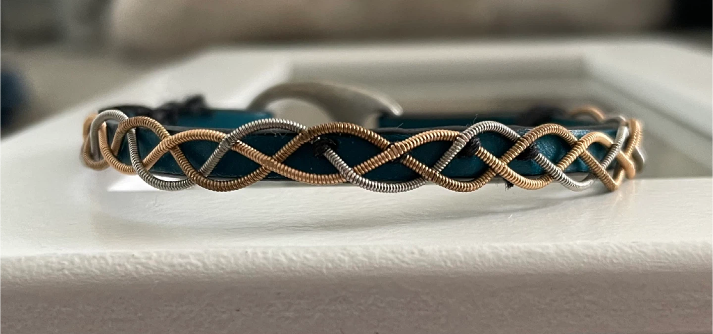 Teal Leather Bracelet with Intertwined guitar strings