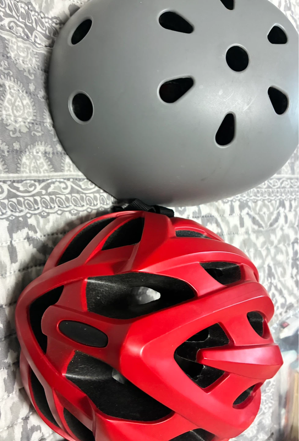 Two Bike Helmets - Red and Grey