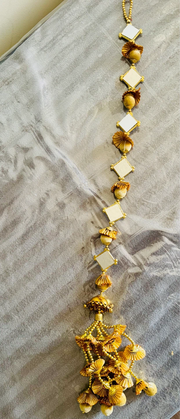 Beautiful golden Paranda for Indian Functions