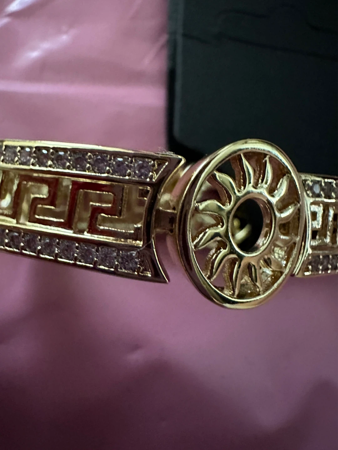 Gold laminated bracelet with sun and Greek key design - photo 2