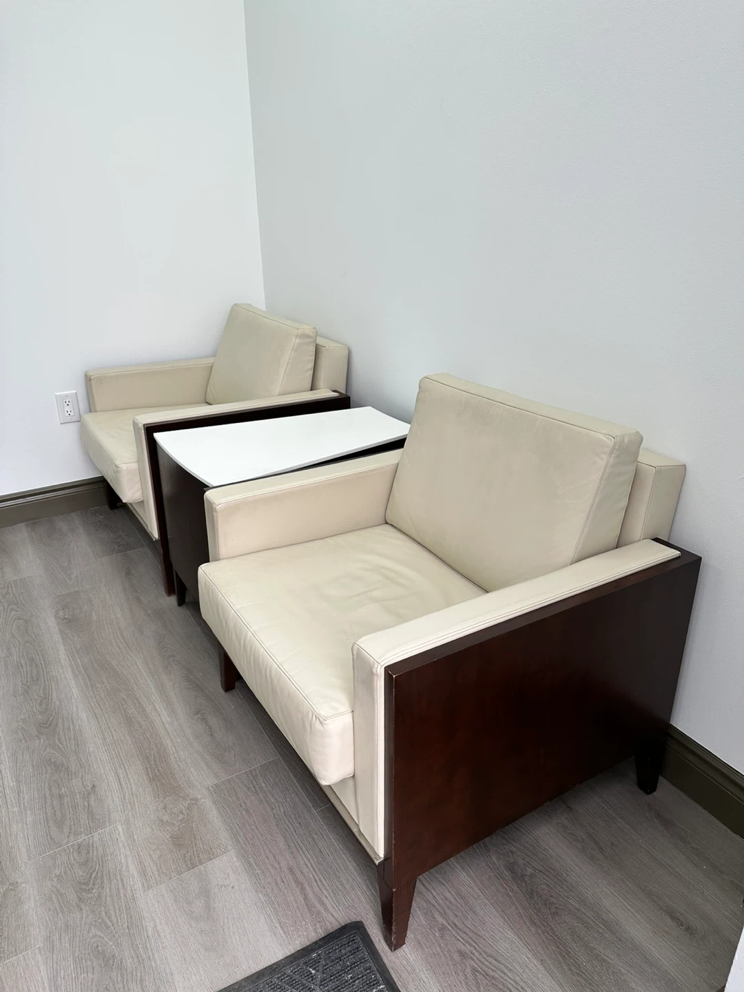 Two cream leather accent chairs with dark wood frames - photo 2