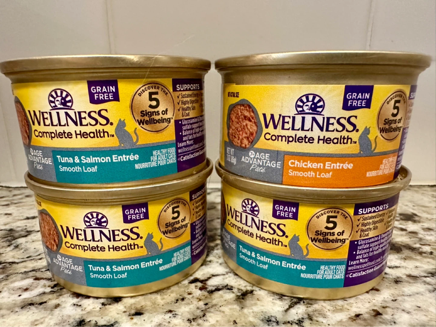 4 x 3oz Wellness cat food + 1x 5.5oz Rawz can