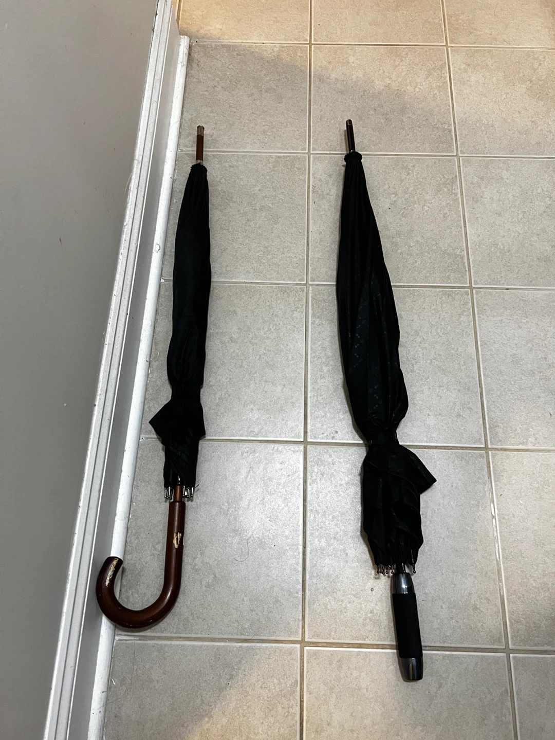 Two Black Umbrellas