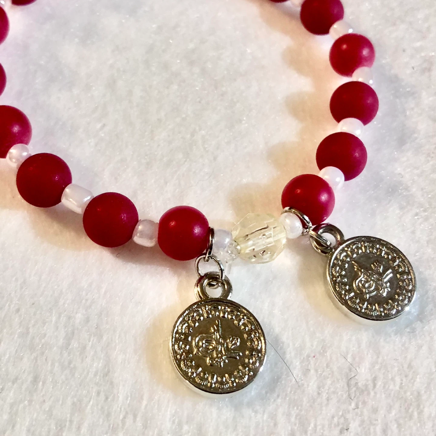Red Beaded Bracelet with Charms