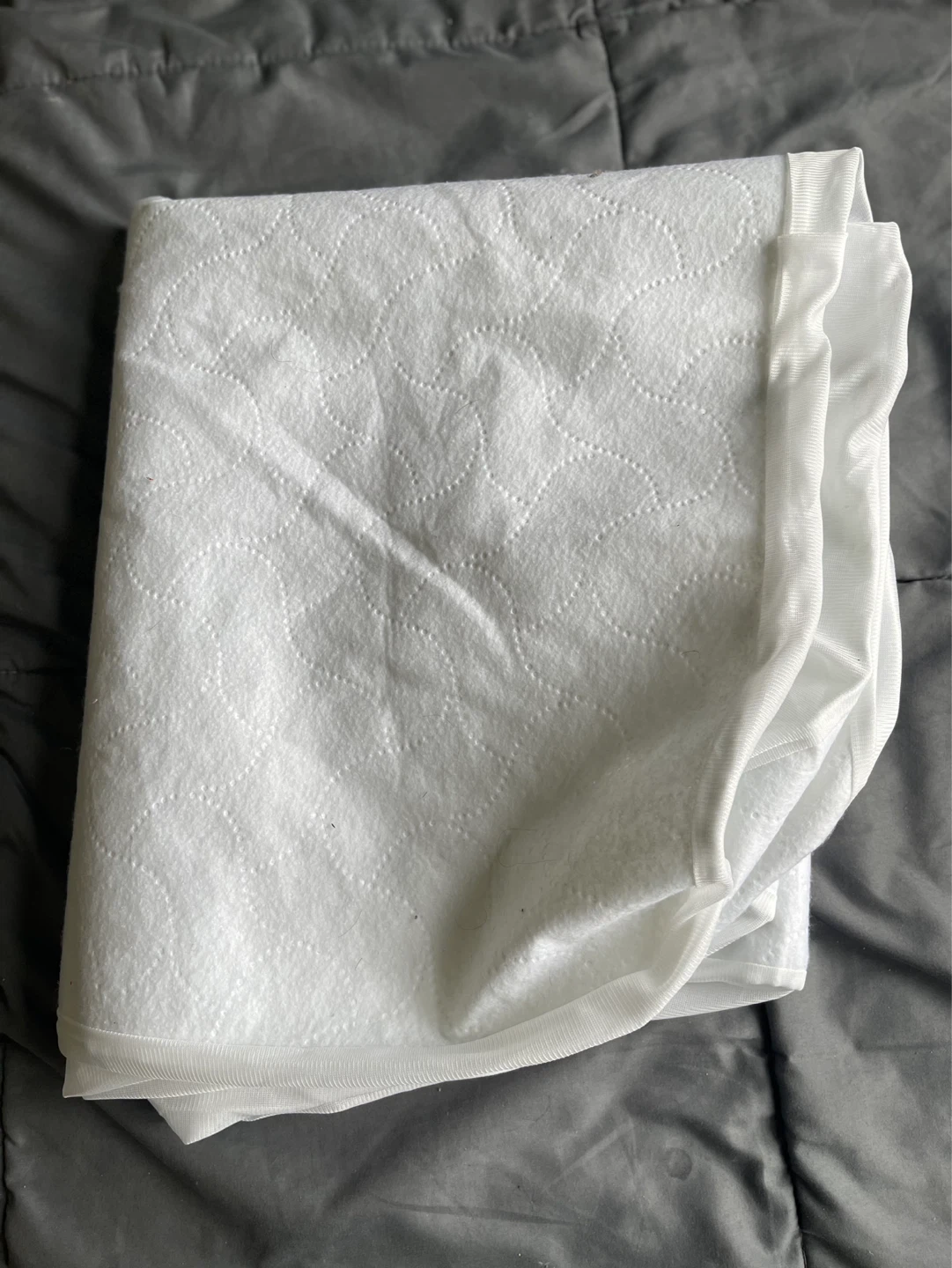 White quilted mattress protector