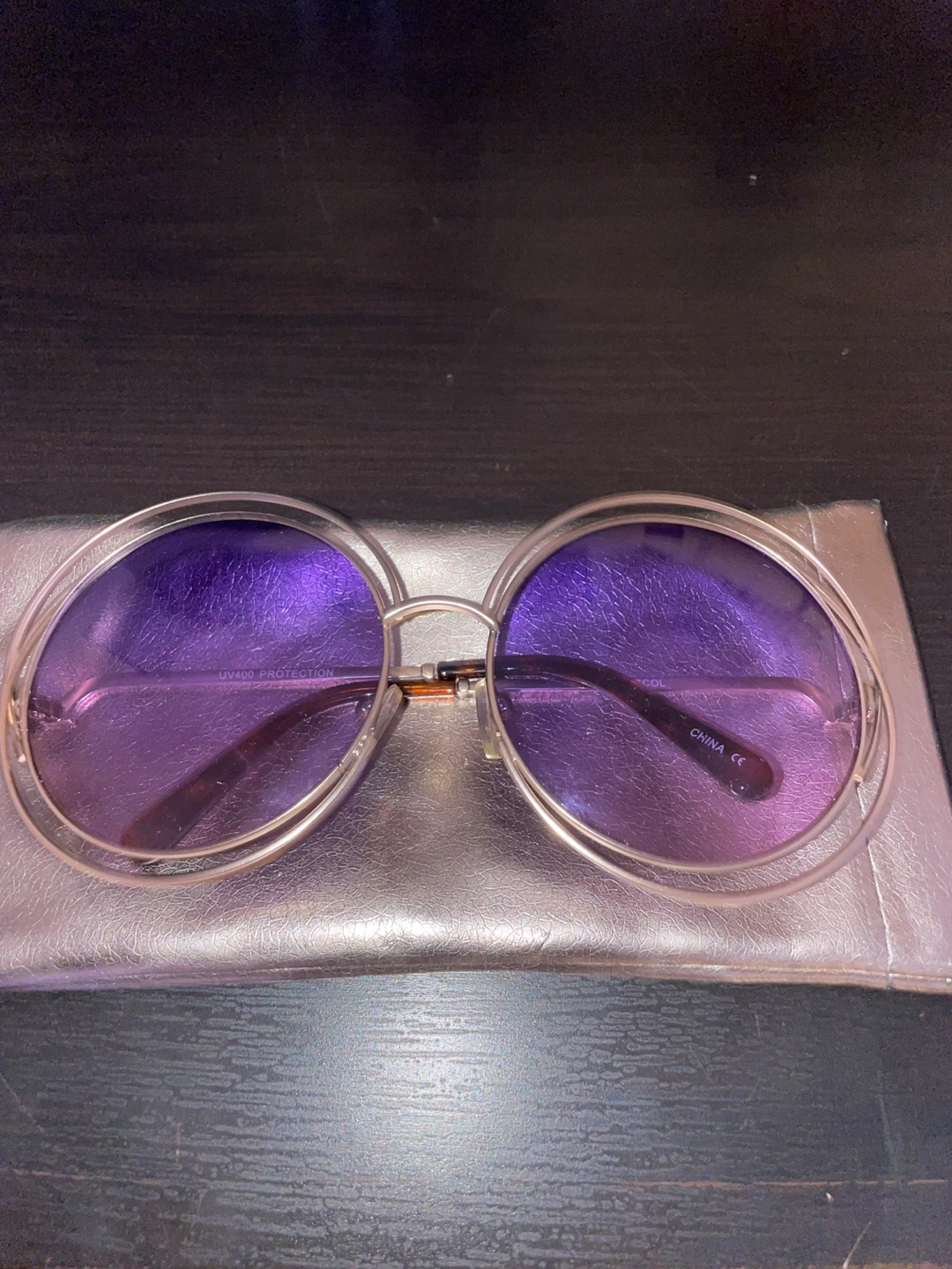 Round Sunglasses with Purple Lenses