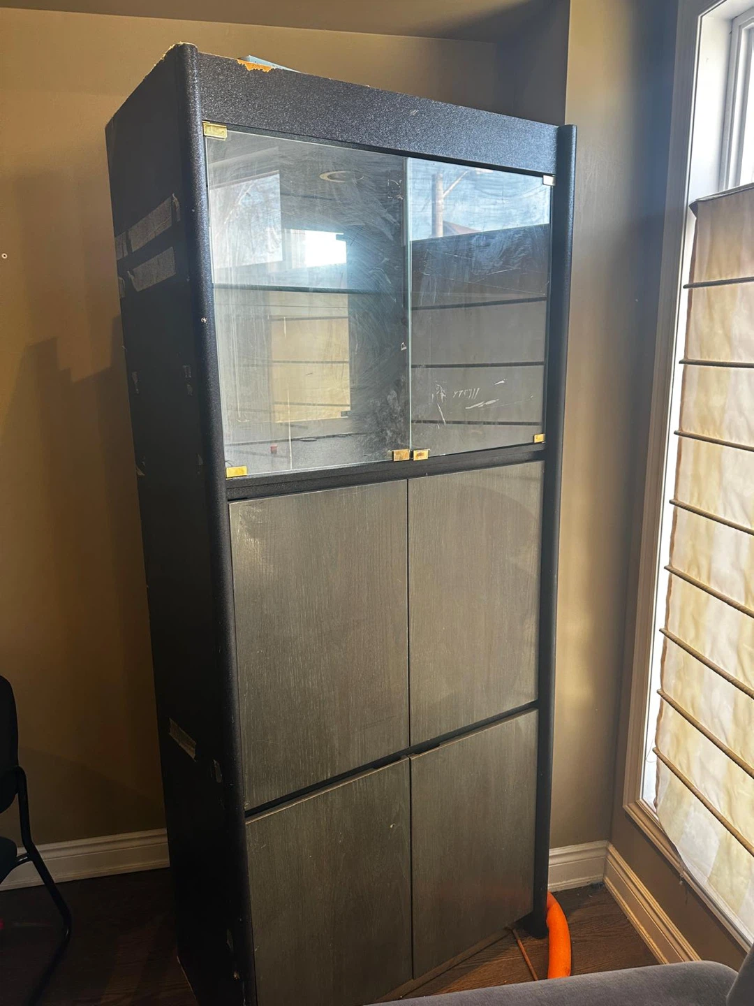 Tall Display Cabinet with Glass Doors and Lower Storage