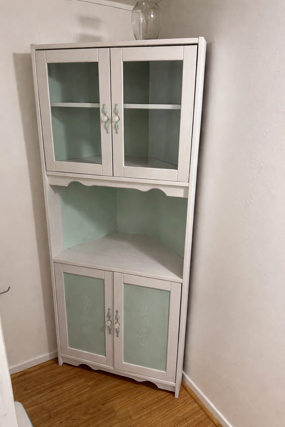 Corner cabinet with glass doors