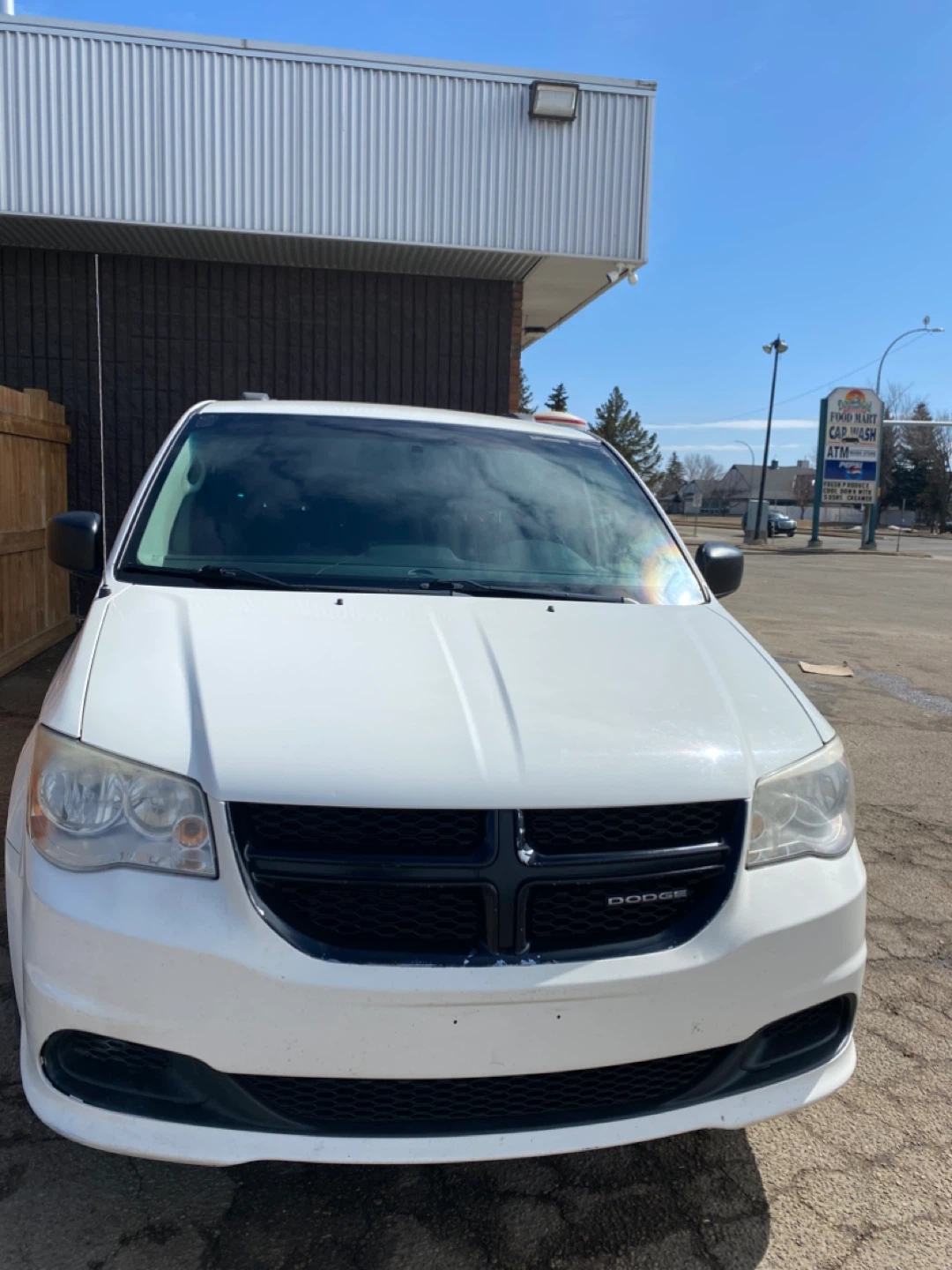 White Dodge Grand Caravan Minivan
