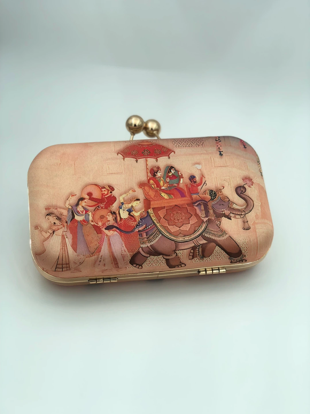 Clutch purse with Indian wedding procession motif